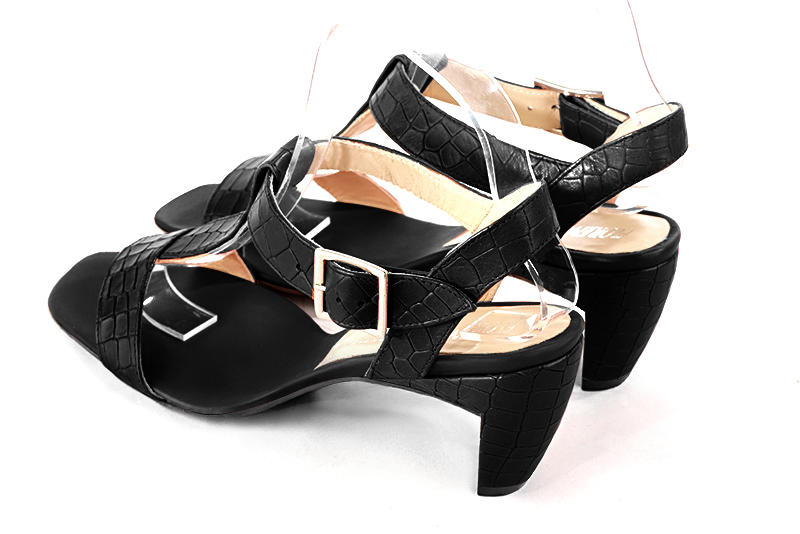 Satin black women's fully open sandals, with an instep strap. Square toe. Medium comma heels. Rear view - Florence KOOIJMAN